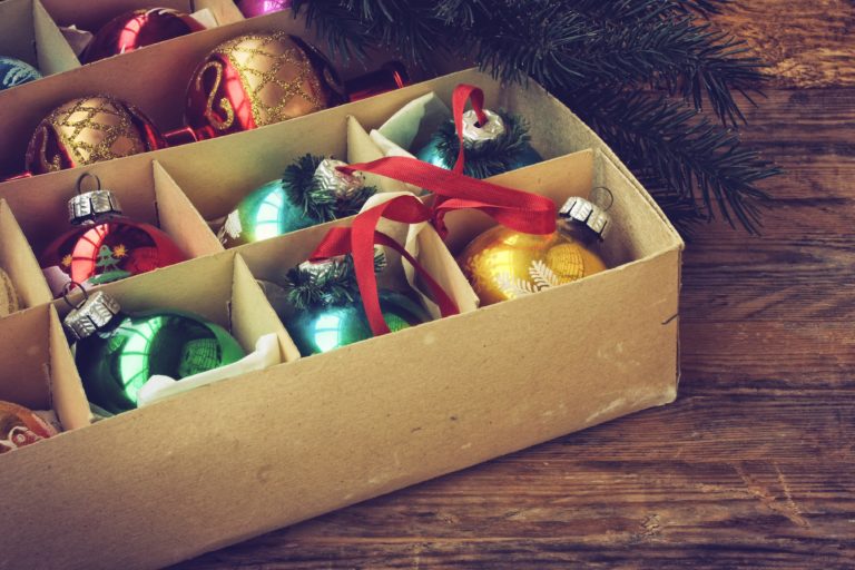 Tree ornaments neatly packed in boxes for storage